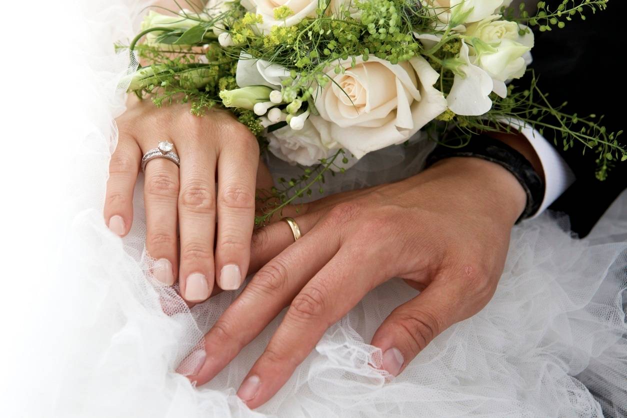 Close-Up Of Newlywed Couple