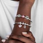 wellenfürmiges lachsfarbenes Murano-Glas Charm – Bild 6